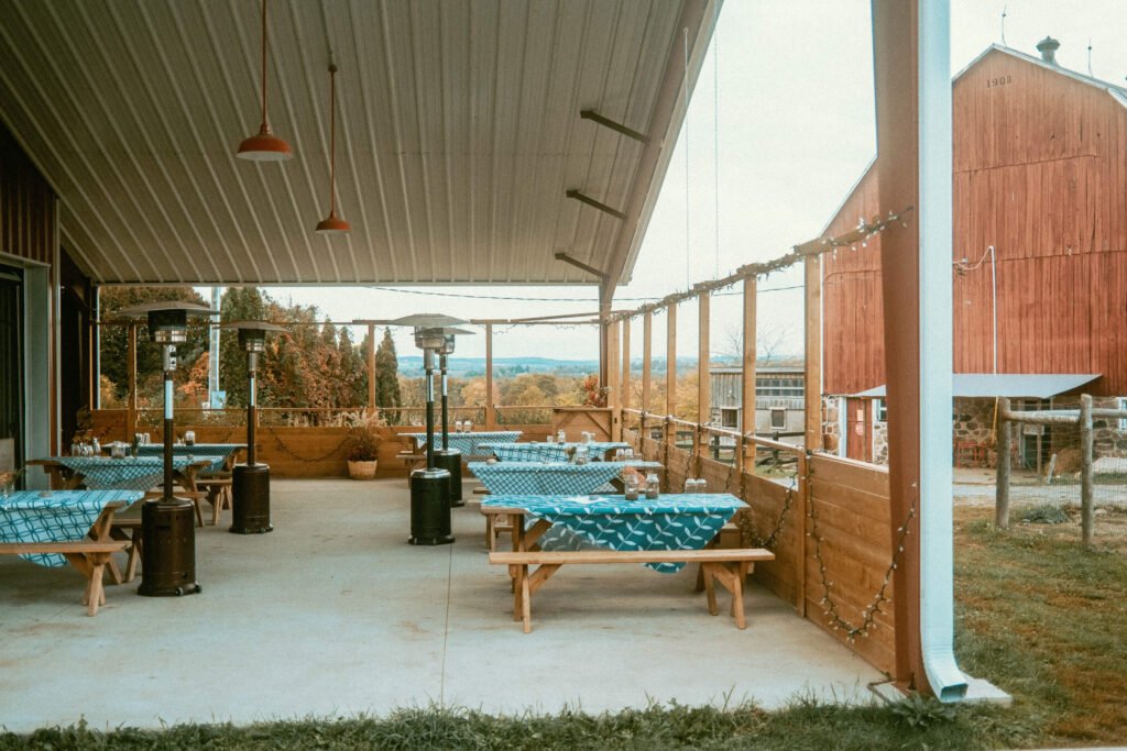 Alternative view of the outdoor patio at Screaming Goat Cafe. This view overlooks the rolling hills of the Northhumerland Valley that Haute Goat sits atop.