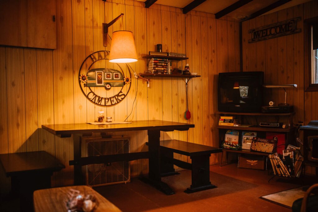Evening Image of the Living area of the rustic cozy cabin in Minden, Ontario - Hipcamp Canada Listing