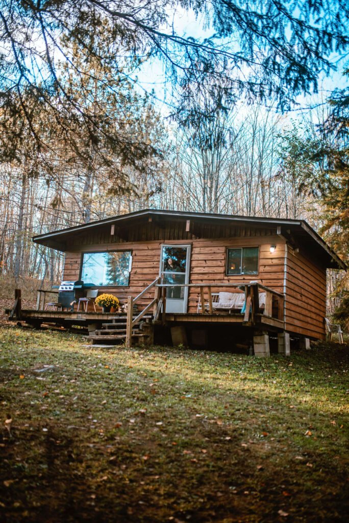 Vertical image of the rustic cozy cabin Hipcamp Canada listing near Minden, Ontario