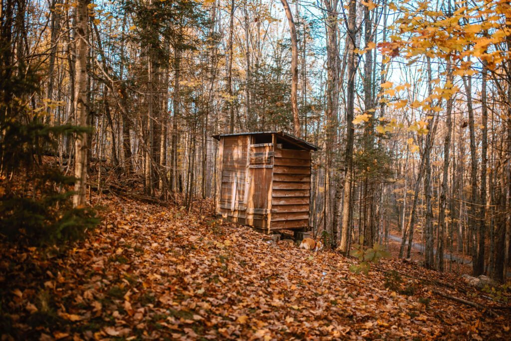 Outhouse at the rustic cozy cabin in Minden, Ontario - Hipcamp Caanada listing