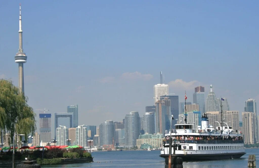 Toronto Island Ferry Approaching the Toronto Centre Island. Toronto's CN Tower and the City Skyline is in the background